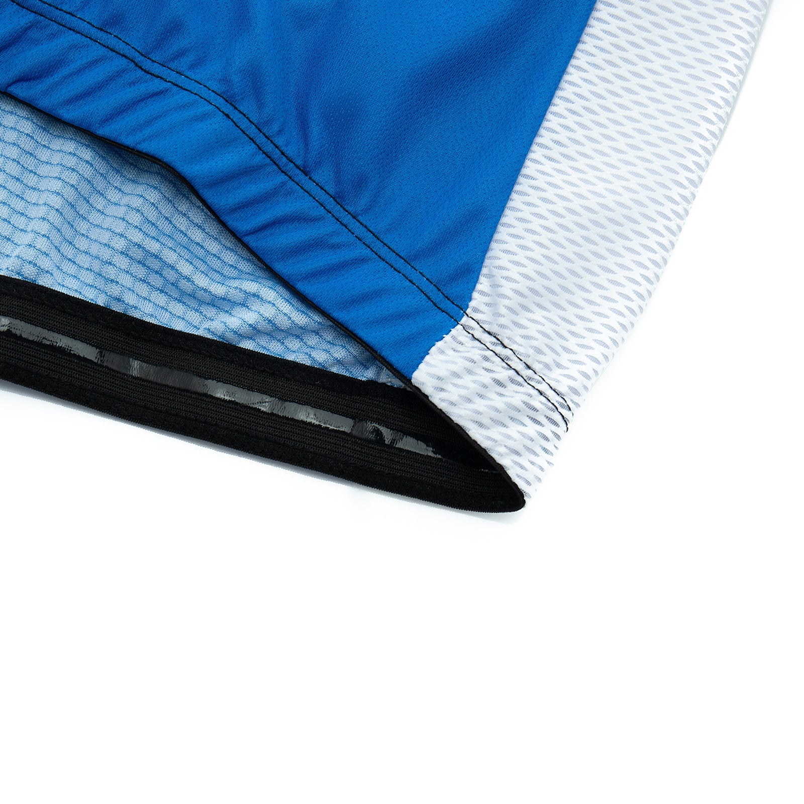Close-up of the Big Foot Sasquatch Cycling Jersey Sets bottom edge shows a blue and gray jersey with black elastic. Made from lightweight polyester, it features a textured design where the blue section contrasts with the patterned gray.
