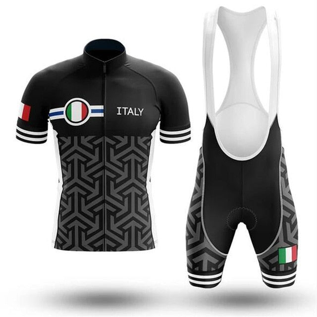 The Italy Pro Team Cycling Jersey Set includes a lightweight black and white jersey featuring geometric patterns, ITALY, an Italian flag emblem, striped sleeves, and black bib shorts with a seat pad and an Italian flag on the leg.