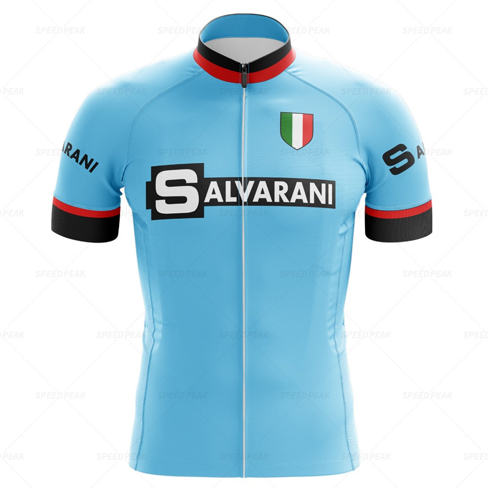 Light blue Salvarani 1972 Retro Cycling Jersey Set with black, white, and red trim. Features Salvarani text on the chest and sleeves, an Italian flag emblem near the collar, reminiscent of Felice Gimondis Grand Tours glory.