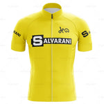 The Salvarani 1972 Retro Cycling Jersey Set features a yellow short-sleeve jersey with Salvarani logos on the chest and arms, a white zip down the center, and black text that recalls Felice Gimondis iconic 1972 rides.