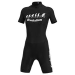 The Womens Evolution Cycling Jersey Set features a short-sleeve jersey with a front zipper, adorned with white evolution graphics from apes to a cyclist and the word Evolution on the chest and left leg.