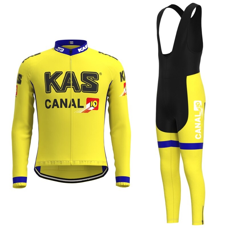 The KAS Canal Retro Cycling Jersey Long Set features a yellow and black design with KAS and CANAL 10 branding, along with blue and red accents. It includes matching bib tights and offers an optional fleece choice for cooler rides or breathable shorts for comfort.