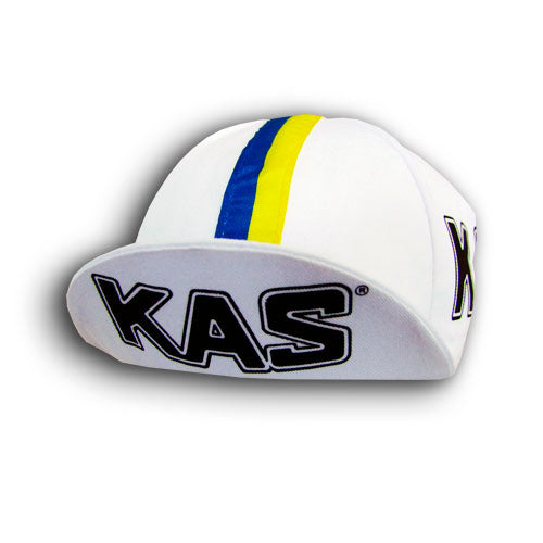 Explore the KAS Retro Cycling Cap at vintagecycling.shop. This white cap boasts a classic design with blue and yellow stripes and KAS in bold black on the front and side—ideal for adding timeless style to any ride.