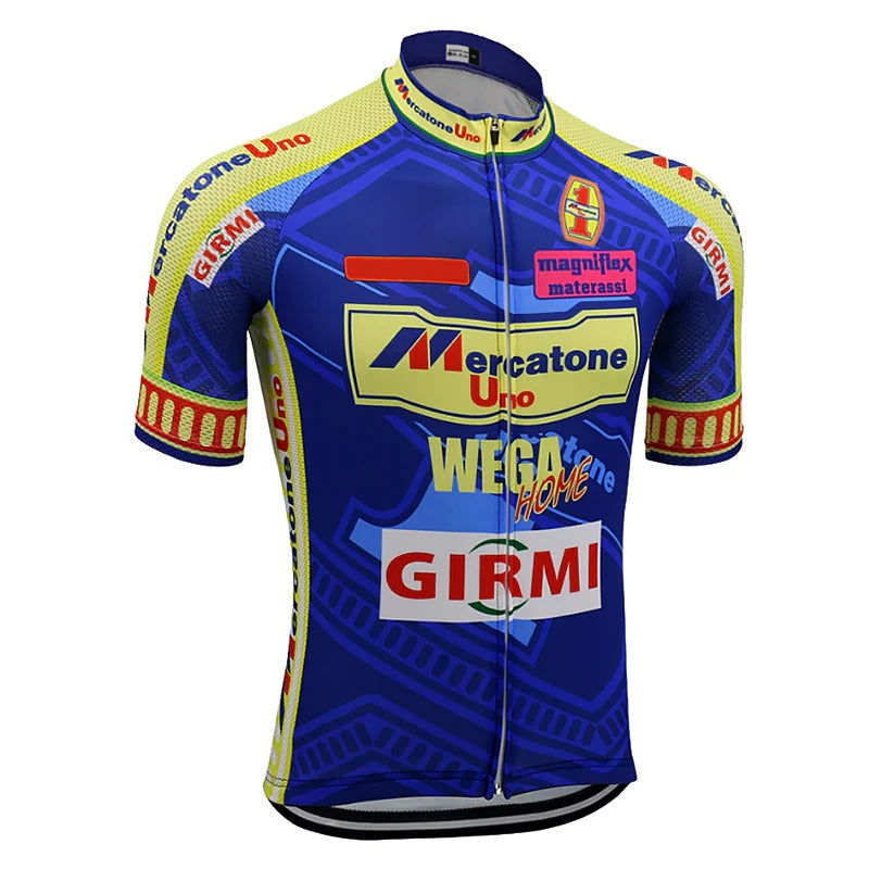 The Mercatone Uno Wega Retro Cycling Jersey Set features a vibrant blue design, bold yellow sleeves, and celebrates Marco Pantanis era with logos like Mercatone Uno, Girmi, and Wega Home. It includes various sponsor names and has a convenient zip-up front.