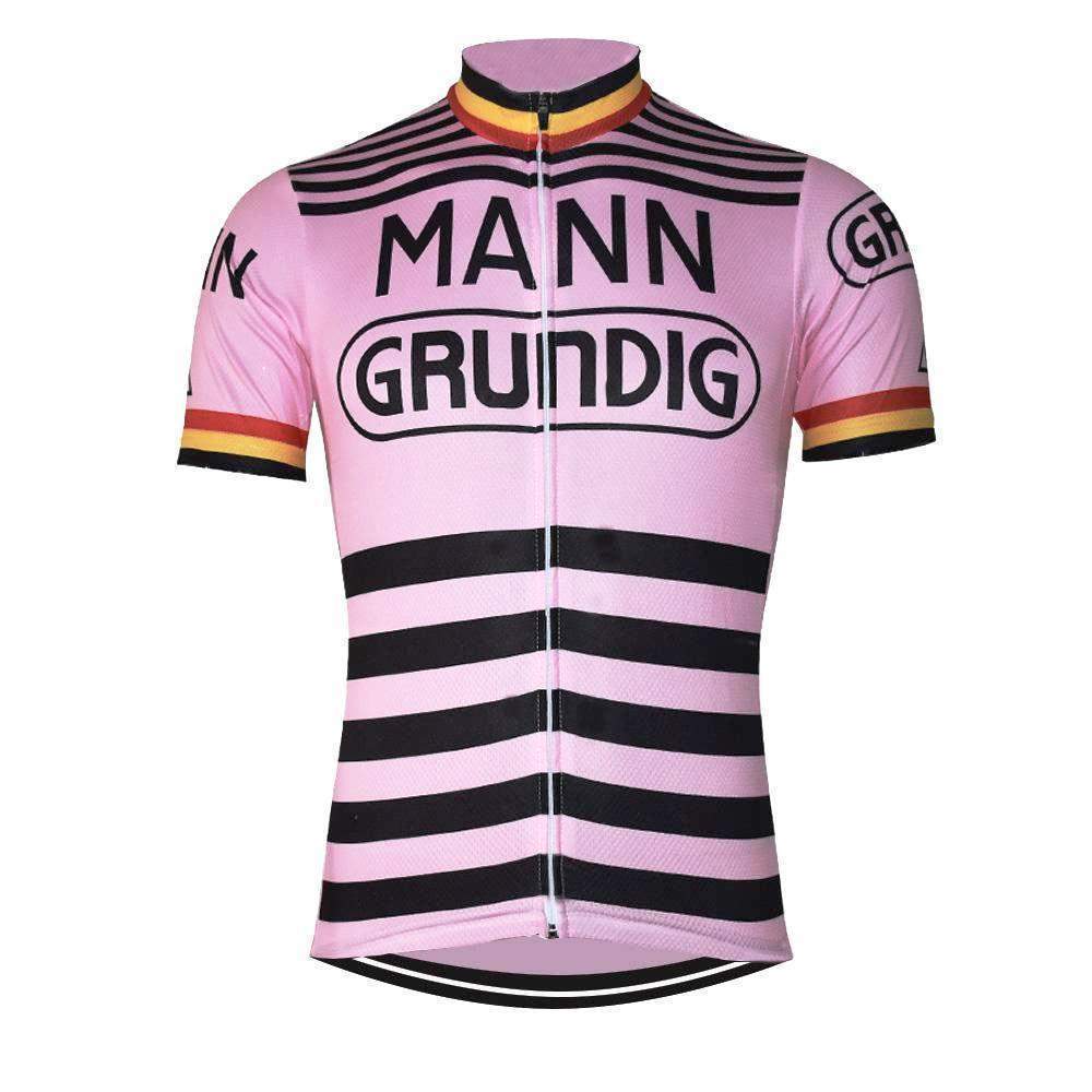 The Mann Grundig Belgium Retro Cycling Jersey is a lightweight polyester pink jersey with black stripes, featuring MANN and GRUNDIG in bold black letters on the front and sleeves. The cuffs are adorned with red, yellow, and black bands for a classic look.