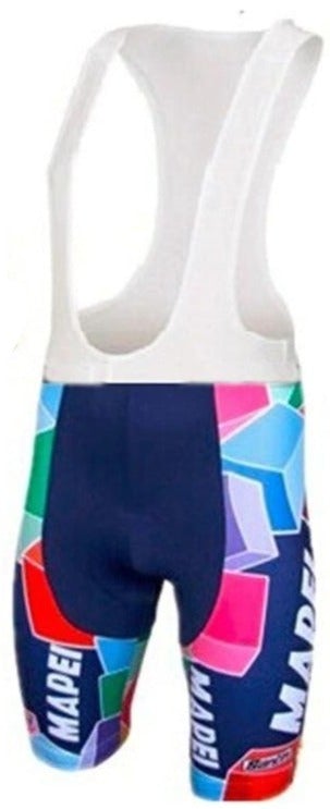 These vibrant cycling bib shorts, inspired by iconic Mapei design, feature white straps and geometric patterns in green, blue, pink, and purple with MADEI text on the side. Comfortable and breathable, theyre perfect for any cycling team ensemble.