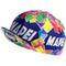 Explore the Mapei Retro Cycling Cap from vintagecycling.shop, featuring a vibrant geometric pattern in pink, yellow, green, and orange. It has MAPEI printed in white on its blue crown for a classic retro look.