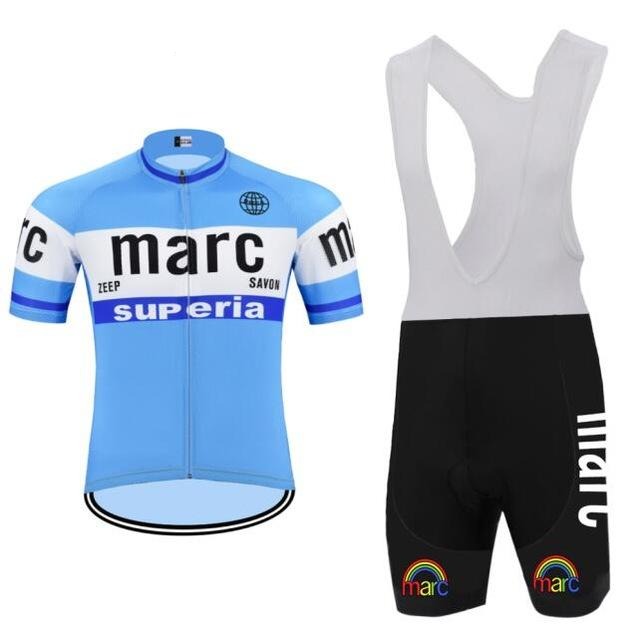 The Marc Superia Retro Cycling Jersey Set includes a blue, breathable jersey featuring marc, zeep, and savon designs, and black and white bib shorts with a rainbow logo. The gel seat pad guarantees comfort for every ride.