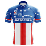 The Motorola Champion USA Retro Cycling Jersey combines a patriotic flair with red and white stripes and a blue top adorned with white stars. Made from lightweight polyester, it features sponsor logos from Motorola, Champion USA, Volvo, and Eddy Merckx. The sleeves and collar are primarily blue.