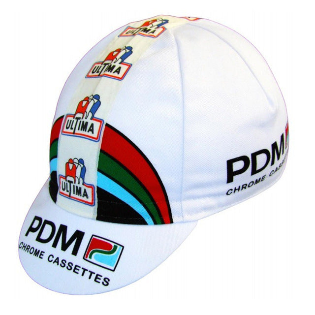 The PDM Retro Cycling Cap boasts classic retro design with a white base, multicolored stripes, and logos of PDM Chrome Cassettes and ULTIMA, evoking vintage cycling or racing style.