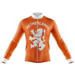 The Netherlands Retro Cycling Jersey (with Fleece Option) features a bold orange design with Netherlands and a white lion emblem on the front, complemented by white cuffs and collar. It captures the essence of classic cycling jerseys against a plain white background.