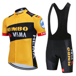 The Jumbo Visma Pro Team Cycling Jersey Set includes lightweight polyester yellow and black jersey and bib shorts, featuring the Jumbo Visma and HEMA logos, mirroring the official team gear.