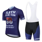 Ride in style with the Purple Sloth Cycling Team Set, a lightweight polyester cycling outfit including a blue jersey and black-blue bib shorts. It features a cartoon sloth on a bike and the slogan Sloth Cycling Team: Faster Than Some... Slower Than Most!.