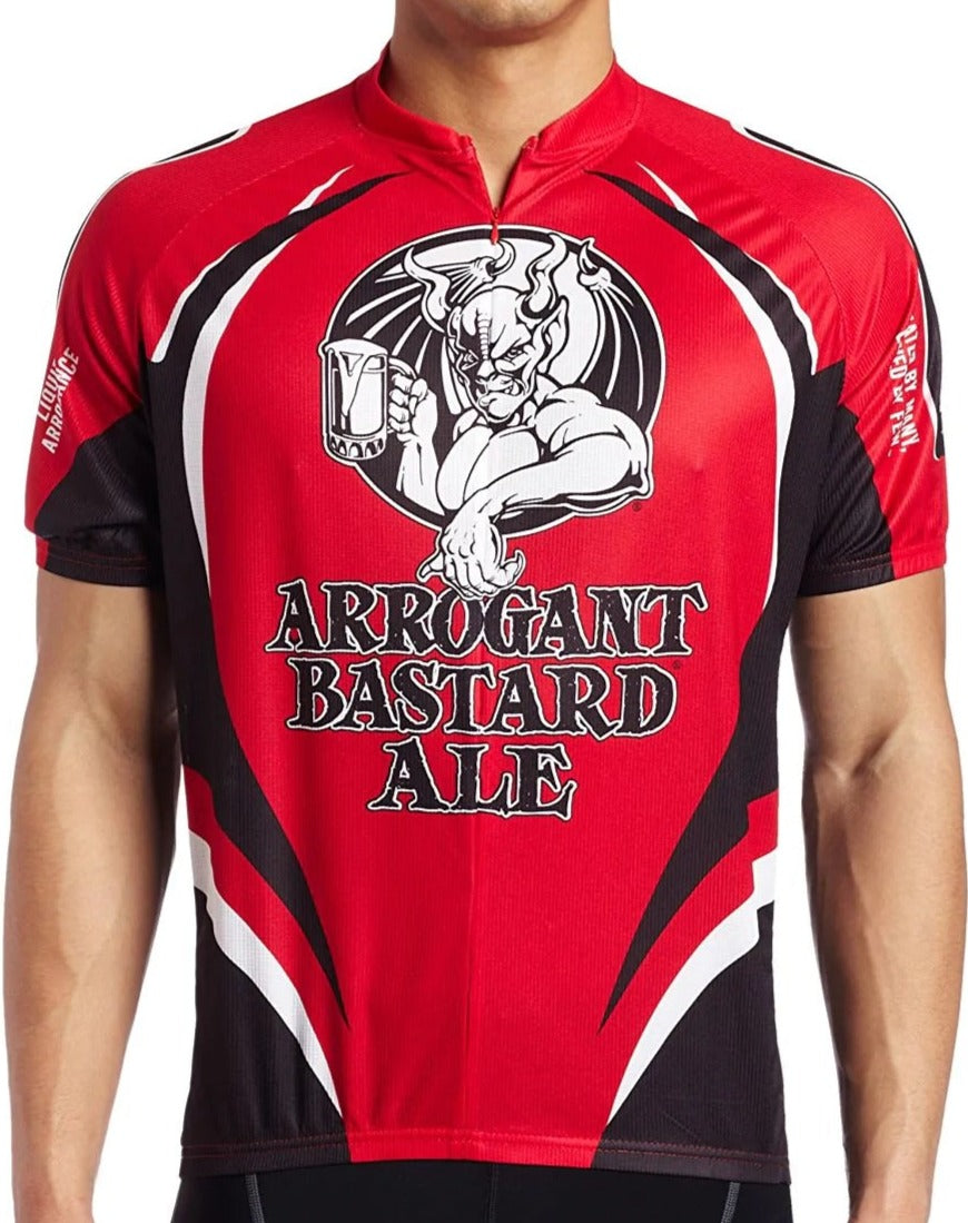 A cyclist wears the Arrogant B*d Ale Cycling Jersey, featuring a red base, a muscular figure raising a beer mug over bold text. Black and white accents on the sleeves add flair to this beer-themed design for spirited riders.