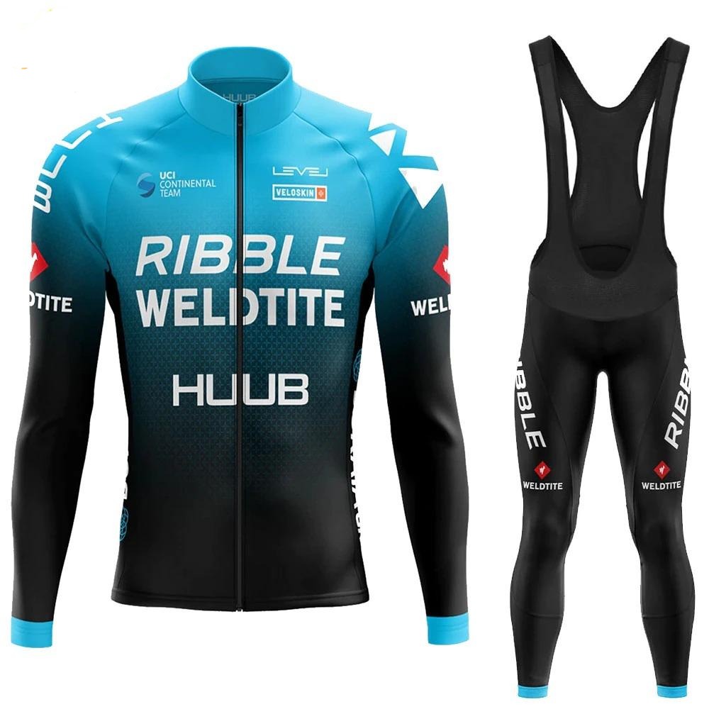 The Ribble Weldtite Huub Cycling Team Long Set, preferred by the UCI Continental team, features a blue and black long-sleeved jersey with a full zipper and bib shorts with shoulder straps. A fleece-lined option is also available for extra warmth during chilly rides.