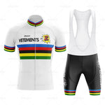 The Tomasso Team Z Vetements Retro Cycling Jersey Set includes a white jersey with rainbow stripes, a pop art Z, a zipper, and Vetements text. The black bib shorts complement the jersey with matching text and design, echoing Greg LeMonds style and the iconic Team Z vibe.