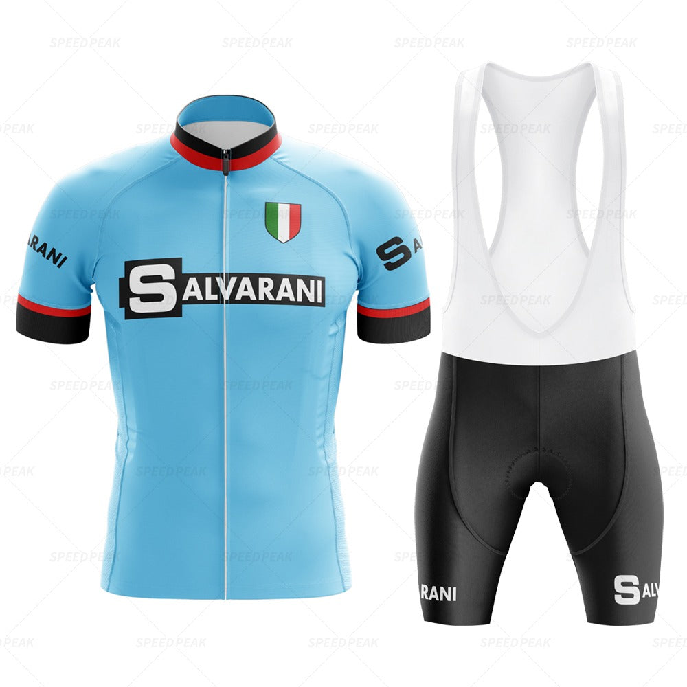 The Salvarani 1972 Retro Cycling Jersey Set includes a blue short-sleeved jersey with SALVARANI text, Italian flag emblem, and black accents. Inspired by Grand Tours, it pairs with black and white bib shorts to evoke Felice Gimondis iconic style.