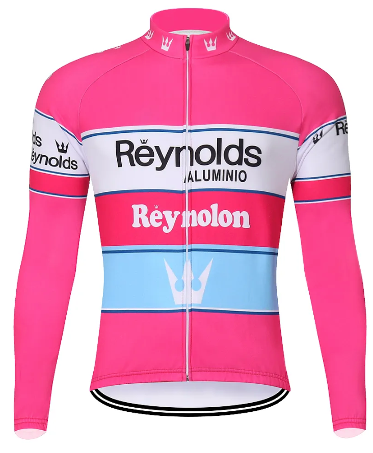 The Reynolds Aluminio Retro Cycling Jersey boasts long sleeves in a vintage pink, white, and light blue design. It features Reynolds ALUMINIO and Reynolon logos with a handy full-length front zipper, ideal for enthusiasts seeking retro flair. Available with a fleece option.