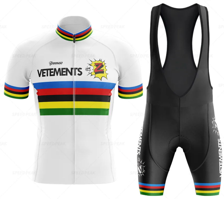 The Tomasso Team Z Vetements Retro Cycling Jersey Set includes a short-sleeve white jersey adorned with green, yellow, black, red, and blue horizontal stripes reminiscent of Greg LeMonds era and black bib shorts with matching stripe accents.