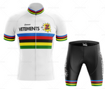 The Tomasso Team Z Vetements Retro Cycling Jersey Set features a jersey with blue, red, yellow, green, and black stripes with a Z graphic and VETEMENTS text. Matching black shorts also display the same elements for a cohesive look.