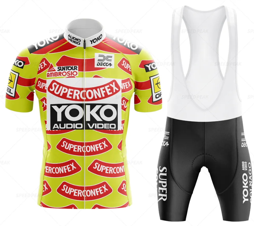 The YOKO Superconfex Retro Cycling Jersey Set captures performance cyclings essence with a yellow jersey featuring red and white YOKO Superconfex and Yoko Audio Video logos, paired with black bib shorts showcasing bold white text for timeless style.
