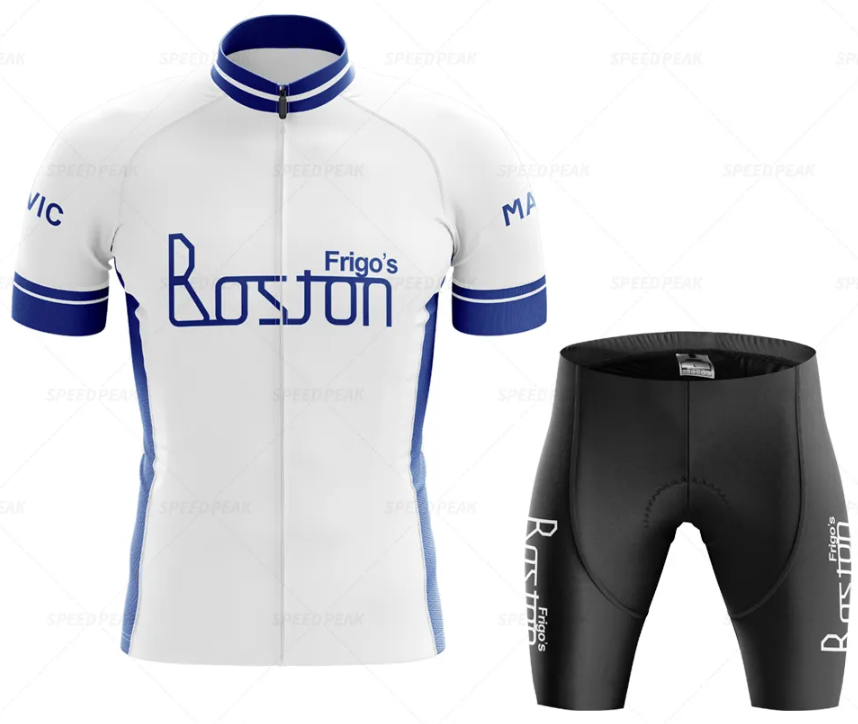 The Frigos Boston Retro Cycling Jersey Set includes a breathable white and blue jersey with Frigos Boston text, featuring short sleeves and a zippered front, paired with black shorts that provide comfort through a padded seat area.