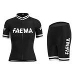 The Womens Faema 1955 Retro Cycling Jersey Set includes a classic black jersey and shorts with iconic white FAEMA text on the chest, sleeves, and shorts. It features a front zipper and white striped cuffs, embodying the timeless charm of a 1955 cycling jersey.