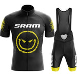 The SRAM Retro Cycling Jersey Set includes a black jersey with short sleeves, a front zipper, and bib shorts, all adorned with a yellow grinning face design and yellow leg accents for a stylish and comfortable road performance.