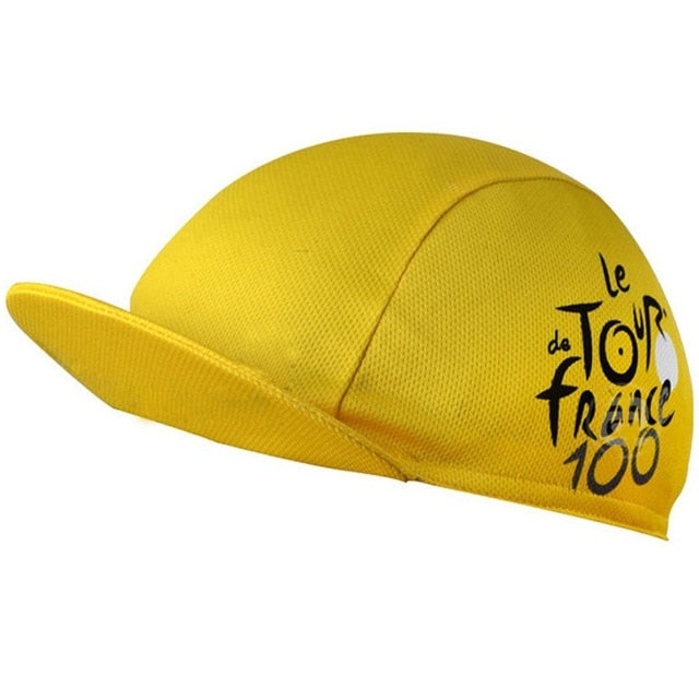 The Tour de France Cycling Cap, in yellow with breathable mesh, features Le Tour de France 100 printed in black on the right side and includes a small curved visor for added style and comfort.