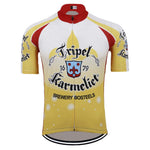 The Triple Karmeliet Beer Retro Cycling Jersey features a vibrant design in yellow and white with red accents, proudly displaying the Tripel Karmeliet logo, Brewery Bosteels, and 1679, ideal for performance cycling enthusiasts.