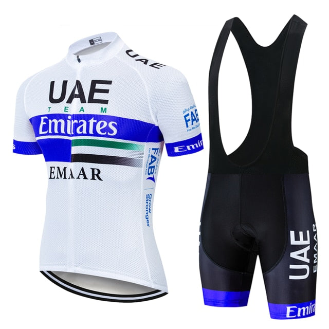 The UAE Emirates Cycling Team Jersey Set, made of lightweight polyester, features a stylish blend of white, black, and blue. The short-sleeve jersey has a zip front, while the bib shorts have black straps with sponsor logos for a professional finish.