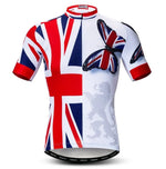 The UK Butterfly Union Jack Cycling Jersey features the flag on the left, a large butterfly on the right, and a faint lion silhouette. Made from lightweight polyester, it includes short sleeves and a full-length zipper for comfort and style.