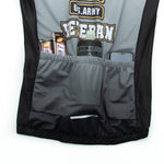 The US Army Veteran Cycling Jersey Set showcases a gray and black design with U.S. Army Veteran text. The rear pockets conveniently hold two energy bars, a water bottle, and a smartphone.