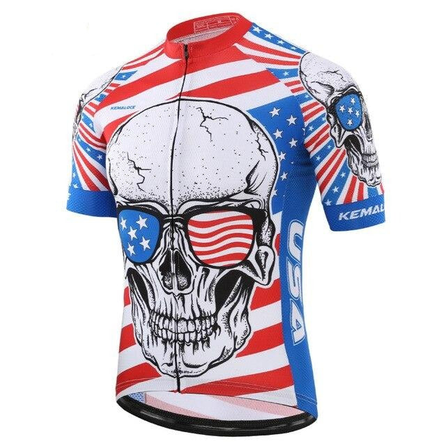 Introducing the USA Skull Cycling Jersey, made from breathable polyester. It features a skull with American flag sunglasses, red and white stripes, blue stars, USA, and the brand name on the sides. The jersey includes short sleeves and a front zipper for comfort while cycling.