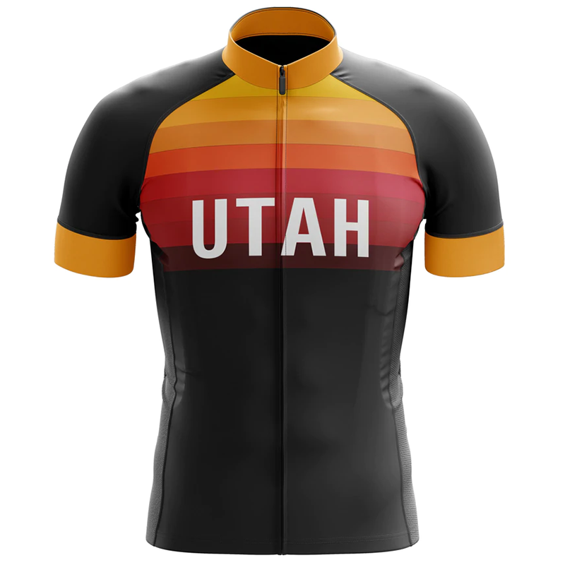 The Utah Cycling Jersey features UTAH on the chest with horizontal stripes in orange, red, and brown. Made from lightweight polyester, it includes orange sleeves and collar, complemented by a sleek black front zipper.