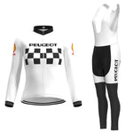 The Womens 1960s Peugeot-Shell Retro Cycling Jersey Long Set includes a jersey with PEUGEOT on the chest, a black-and-white checkered design, red Shell logos on the sleeves, and classic bib pants featuring PEUGEOT on the side.