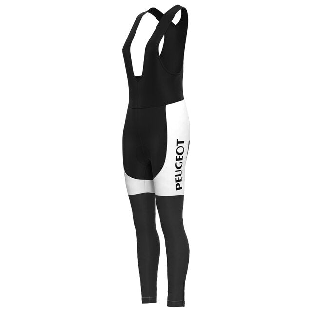 The Womens 1960s Peugeot-Shell Retro Cycling Jersey Long Set features a black and white design with PEUGEOT printed vertically on the left, capturing the retro vibe with black straps and a mix of black and white panels for a nostalgic look.