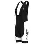 The Womens 1960s Peugeot-Shell Retro Cycling Jersey Set includes black and white bib shorts with PEUGEOT vertically printed on the white thigh sections, featuring shoulder straps and a sleek, retro design.