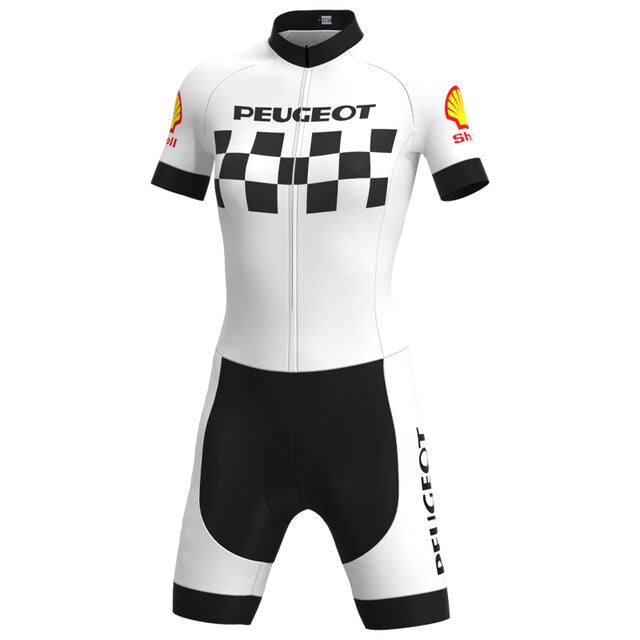 The Womens 1960s Peugeot-Shell Retro Cycling Jersey Set features a black and white checkered pattern with Peugeot text, short sleeves, black shorts, and Shell logos on the shoulders—ideal for fans of classic cycling apparel.