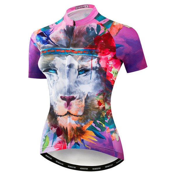The Womens Bright Lion Cycling Jersey features a vibrant lion design amidst floral patterns, with the top half in a pink and multicolored abstract style of blues, reds, and greens. Its the perfect blend of style and functionality for passionate cyclists.