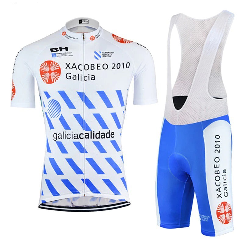 The Xacobeo Galicia 2010 Retro Cycling Jersey Set features a vintage white and blue design with Xacobeo 2010 Galicia and red shell logos. It includes matching sleek blue bib shorts, reminiscent of the Tour de France era for an iconic look.