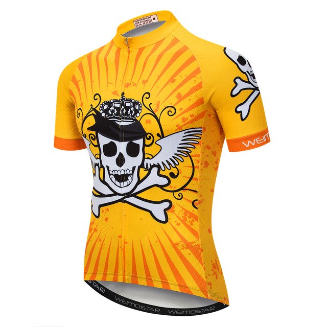 Introducing the Yellow Pirate Skull Cycling Jersey, crafted from lightweight polyester with a vibrant yellow color. It showcases a crowned skull and crossbones with wings on the chest, smaller sleeve designs, orange accents, and a front zipper for convenience.