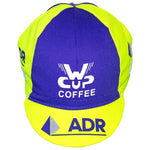 The ADR Agrigel Retro Cycling Cap features a vibrant yellow and blue design with W Cup Coffee in white on the front and ADR with a triangular blue logo on the brim, evoking vintage cycling styles and celebrating ADR Agrigels heritage.