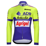 The ADR Agrigel Bottecchia 1989 Retro Cycling Jersey (with Fleece Option) features a vibrant yellow and blue design with logos like ADR, Agrigel, and Mavic, capturing the spirit of their legendary racing legacy.