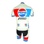 The Pepsi Fanini Retro Cycling Jersey Set showcases the iconic logo in vibrant red, white, and blue. Made from lightweight polyester, it features stars and geometric patterns that stand out against a plain white background.