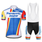The Panasonic-Isostar Retro Cycling Jersey Set features a lightweight polyester jersey with blue, yellow, and red stripes, paired with white bib shorts accented in blue. This breathable and comfortable set offers both style and performance for cycling enthusiasts.