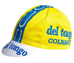 The Del Tongo Colnago Retro Cycling Cap features a yellow design with blue and white accents, displaying Del Tongo and Colnago in blue on the side and brim, making it a bold choice for vintage cycling fans.