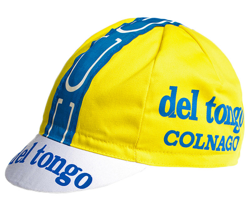 The Del Tongo Colnago Retro Cycling Cap features a yellow design with blue and white accents, displaying Del Tongo and Colnago in blue on the side and brim, making it a bold choice for vintage cycling fans.