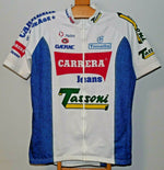 The Carrera Jeans Tassoni 1993 Retro Cycling Jersey in white and blue, inspired by Marco Pantani, features short sleeves, a full zip front, collar, and vibrant logos on the chest, sleeves, and sides.