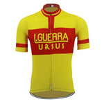 The Learco Guerra Ursus Retro Cycling Jersey in yellow features red horizontal stripes on the chest and sleeves, bold I. Guerra Ursus text celebrating the 1954 Giro dItalia, a front zipper, and a sleek design reflecting Learco Guerras iconic style.